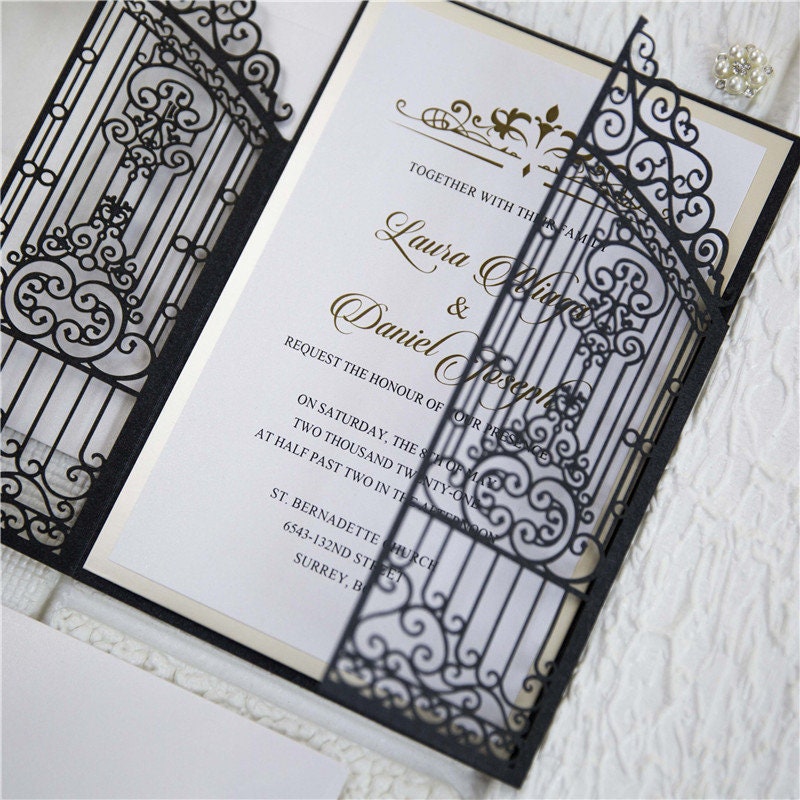 Iron Gate Lasercut Wedding Invite in Black Shimmer, with gold foiled belly band