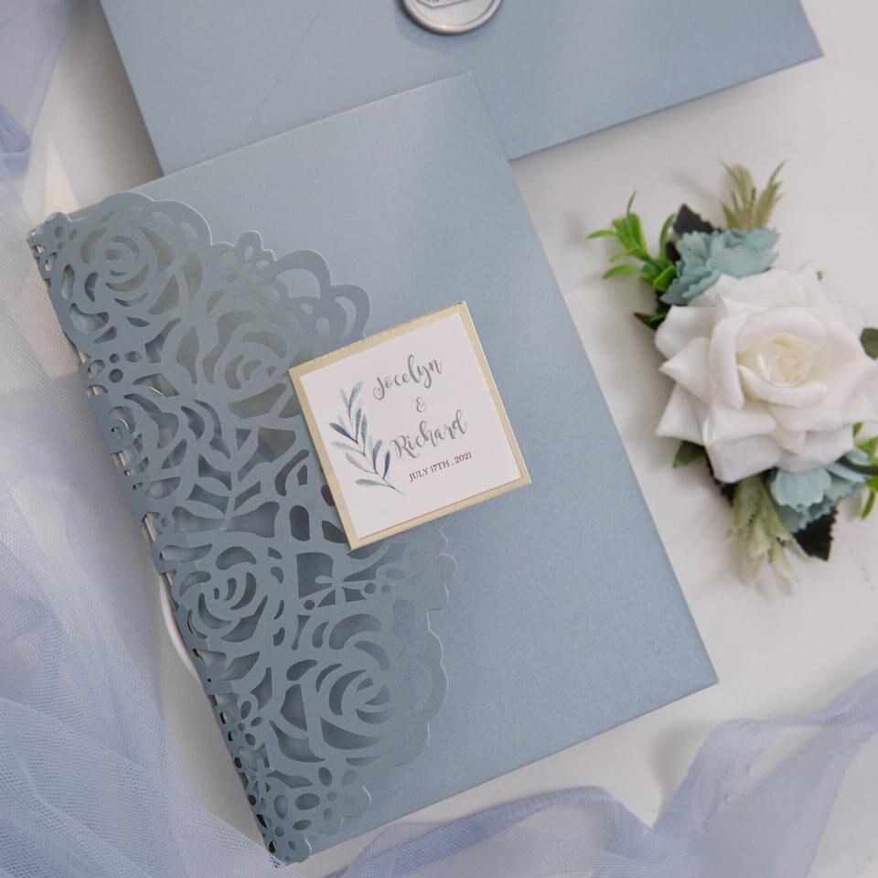 Dusty Blue Rose Lasercut Pocketfold Wedding Invitation with Silver Wax Seal & RSVP Insert
